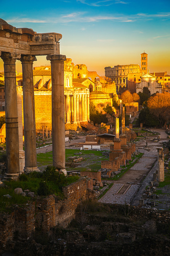 The eternal city: Rome, imperial forums with the Colosseum in the background at sunset
