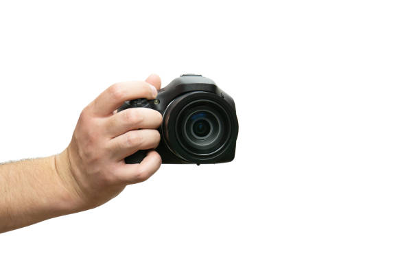 istock male hand holding modern digital camera isolated on white background 2045847609