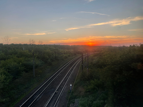 red sunset on railway