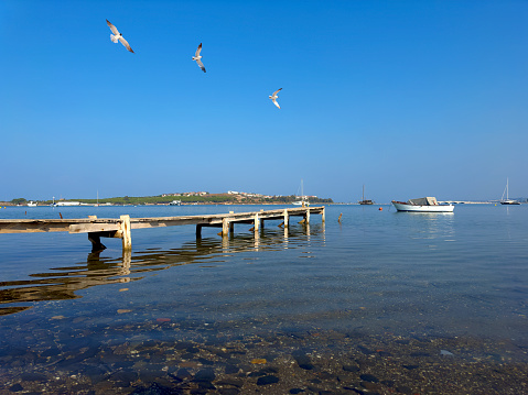 Wooden boat deck at small seaside town Ayvalık, Cunda, Aegean Turkey