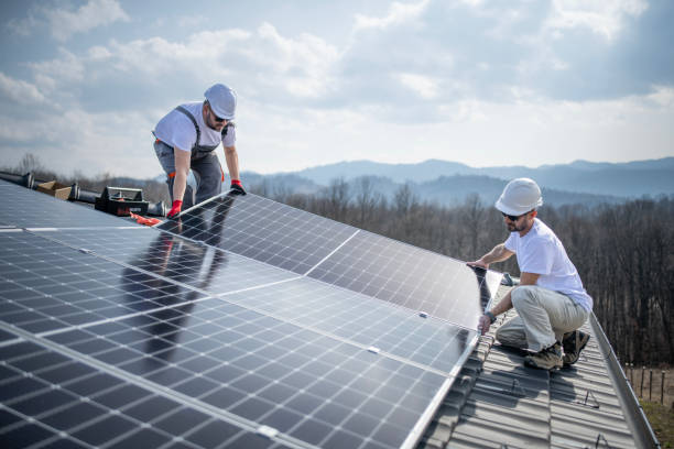 istock Workers installing photovoltaic panels at new house. 2045861890