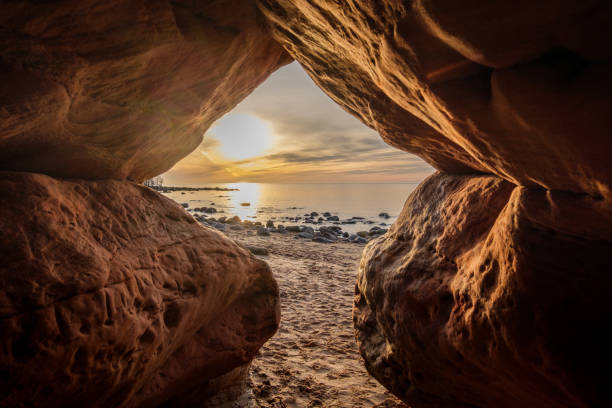 istock Cave's Twilight: Sunset Magic in Veczemju Klintis 2045875979