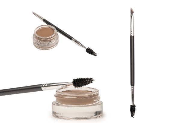 istock A brow pomade in blonde shade with brush isolated on a white background. 2045879137