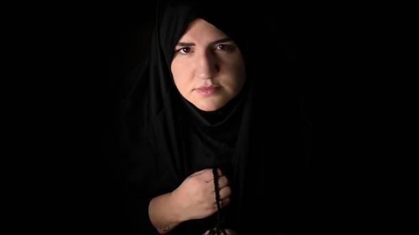 istock Religious muslim woman in prayer outfit 2045893749