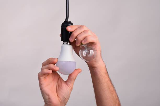 istock incandescent lamps and LED lamp. The concept 2045911879