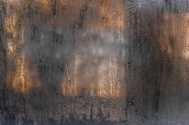 istock a wet fogged window with water droplets 2045924896
