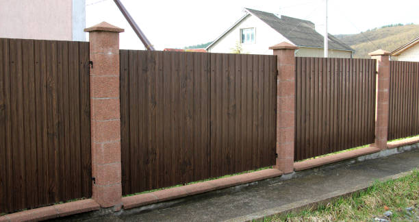 istock The fence is mounted from a metal profile 2045930610