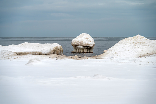 Rocks and ice on the shore of the Baltic Sea, Kaltene, Latvia