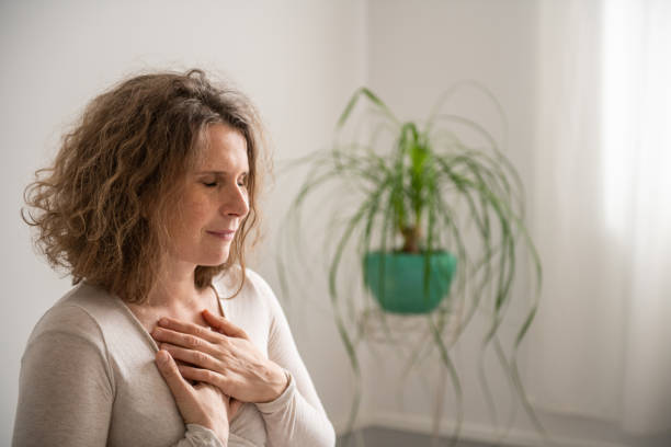 istock Woman doing yoga at home 2045965499