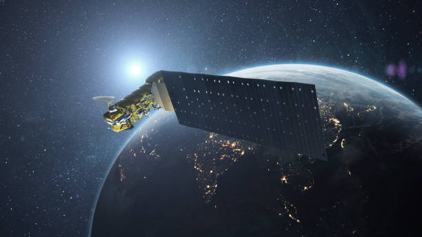 istock Technology satellite flies in orbit near blue planet Earth with sun. Space satellite orbiting the earth. Aqua is a NASA Earth Science 2045985846