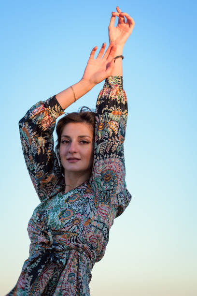 istock Woman With Long Hair Standing on Beach 2046005965