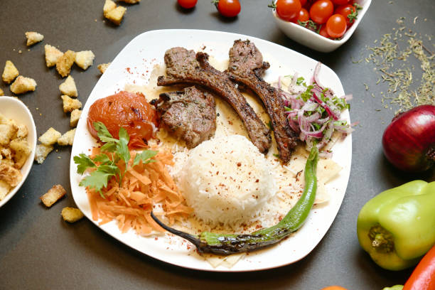 istock White Plate With Meat and Veggie Delight 2046058286