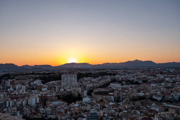 istock Alicante Spain in the rays of the setting sun, evening twilight. Panoramic view. 2046073605