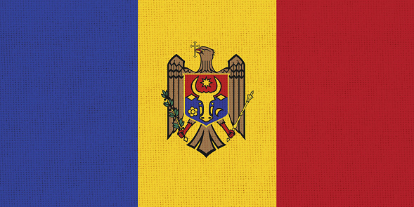 Flag of Moldova. Moldavian state symbol. flag on fabric surface. Fabric texture. Moldovian state symbol. National symbol of Moldova. European country