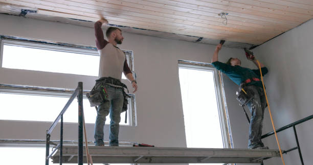 istock Men build wood ceiling in home 2046087285