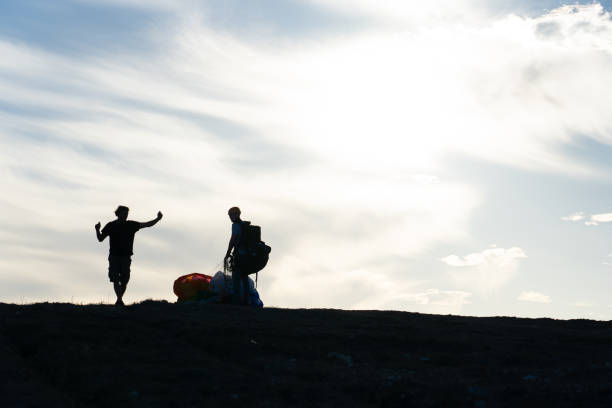 istock Paragliding class. Teacher explaining how to paraglide to a student 2046100964