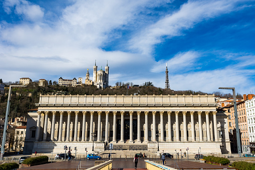 Historic Palais de Justice in Lyon with its 24 columns at the foot of the Fourvière hill, along with its Basilica and metal tower