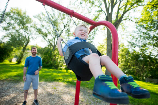 istock The BEST time playing with Dad on the Swing set 2046132798