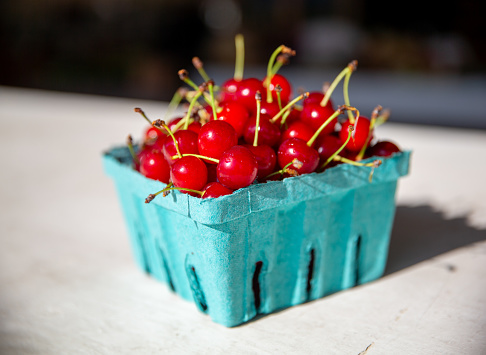 fresh cherries in a container