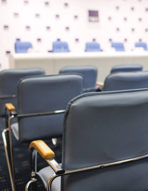 istock Empty modern conference hall, venue for congress lecture, line row of chairs, auditorium for convention and press conference event, interior of room for presentation with a lot of seats and no people 2046150407