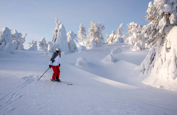 istock Woman downhill skiing 2046164200