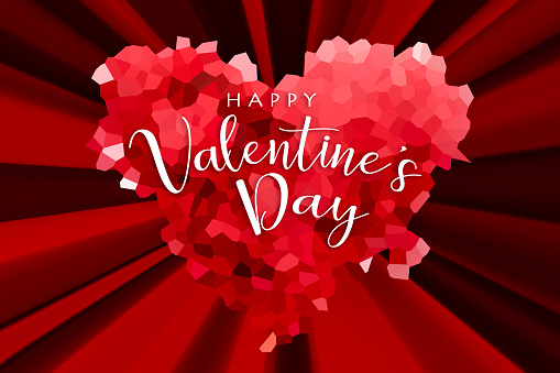 Red low poly styled heart with radial light beams and HAPPY VALENTINE'S DAY lettering. Can be used as a design for Valentine's day holiday greeting cards or posters.