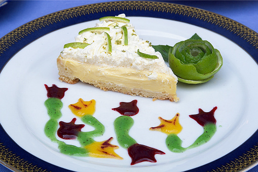 Lemon pie, slice of lemon cake decorated with flavored jams and lemon peel, dessert and food