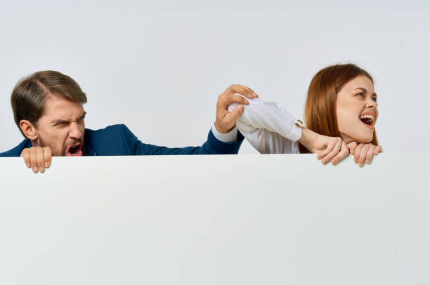 man and woman cropped view white banner advertisement presentation officials. High quality photo