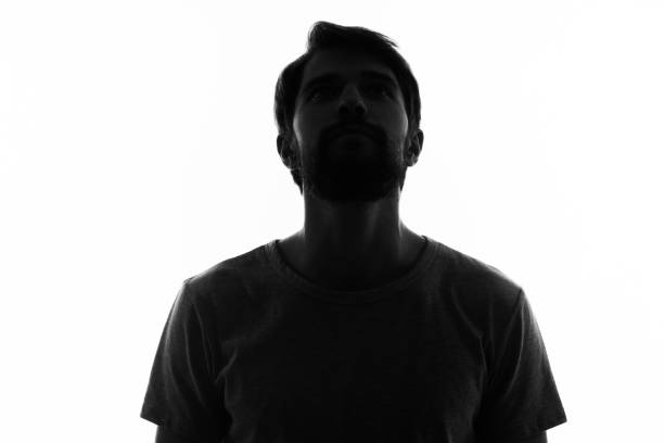 istock silhouette man portrait closeup cropped view white background 2046224057