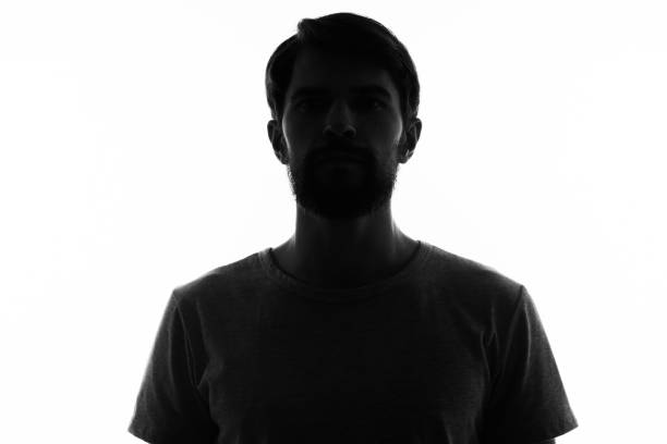 istock portrait of a man dark silhouette on a light background cropped view Copy Space 2046226209