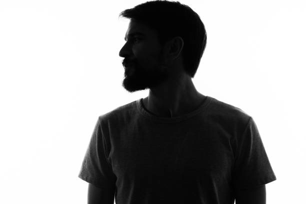 istock portrait of a man dark silhouette on a light background cropped view Copy Space 2046233230