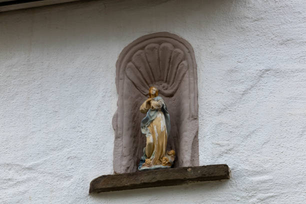 Kronenburg, Germany. 17 february 2024. A statue above a door in Kronenburg, Kronenburg is a medieval village. It is just within the Nord Eifel Nature Park