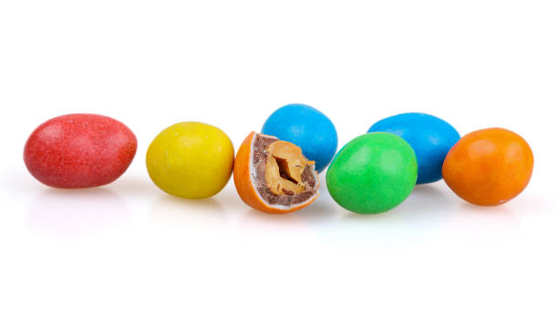Peanuts covered with chocolate and colored caramel. Chocolate dragee.
