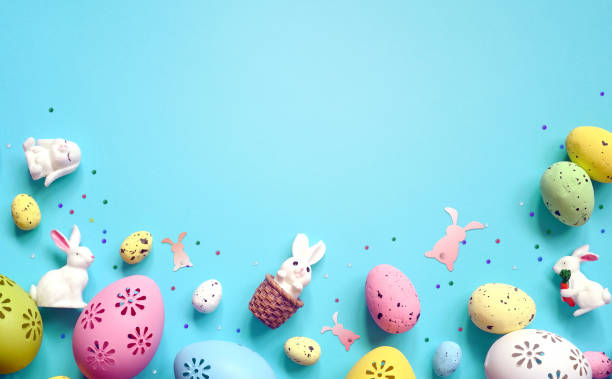 istock Collection of stylish colors eggs with flowers for Easter celebration on blue background. 2046247098