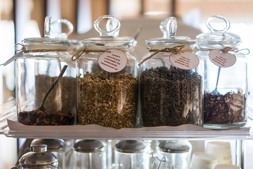 Various herbal teas in glass jars