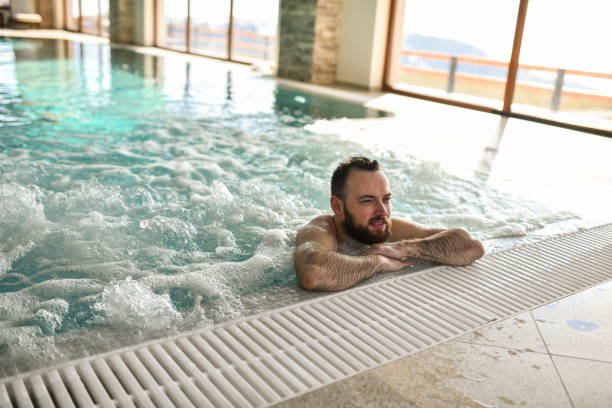 istock Male Experiencing Tranquility In Pool During A Relaxing Weekend Getaway 2046314174