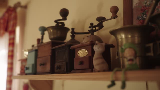 Various vintage wooden boxes kept on a table in a house.