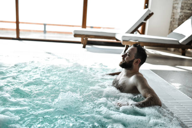 istock Bubbly Relaxation In Pool For Handsome Bearded Male 2046316872