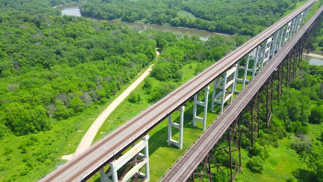 Two Railroad Trestle Bridges Over River