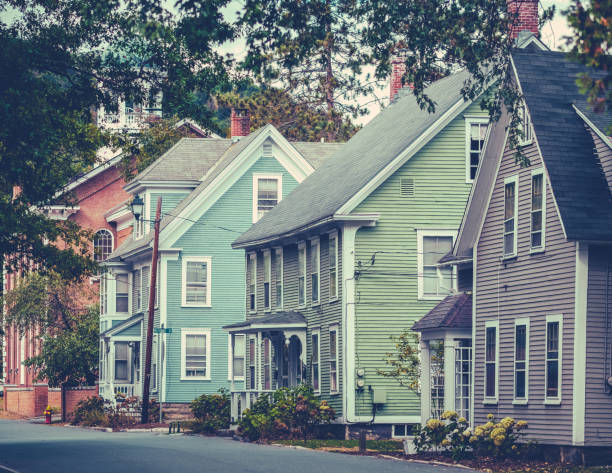 Retro Style Image Of Pretty Pastel Colored Houses In A Rural Town In Vermont In The Fall