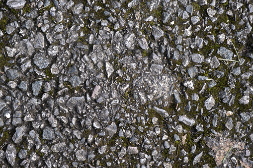 Whether used to enhance the realism of 3D models or to add texture to digital illustrations, the rough concrete texture close-up serves as a testament to the beauty found in the ruggedness of urban landscapes. It invites viewers to appreciate the tactile qualities and visual interest of concrete, making it a timeless and versatile element in design and visual arts