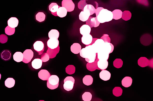 istock Pink defocused bokeh lights  blur sparkling background Shining lights 2046360536