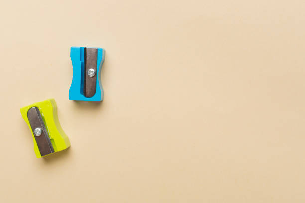 istock Different sharpeners on color backgroung, top view 2046371087
