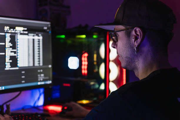 istock Professional editor working with his computer full of LED lights in his work office 2046396375