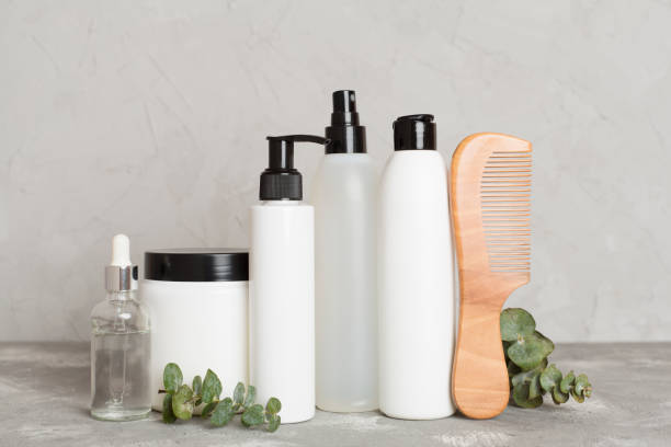 istock Professional hair care products with comb on table 2046425958