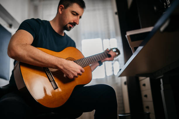 istock Recording myself with a guitar 2046491749