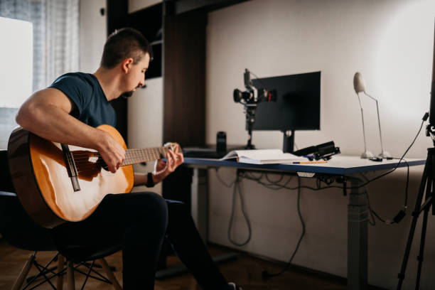 istock Recording myself with a guitar 2046492281