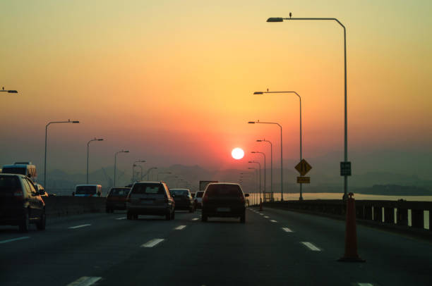 Sunset on the Rio-Niteroi Bridge between the two cities, Brazil.