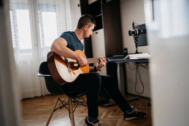 istock Recording myself with a guitar 2046494390