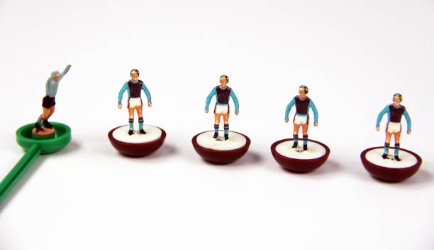 istock Little Soccer Player Toys. Small figures on white background. 2046503825